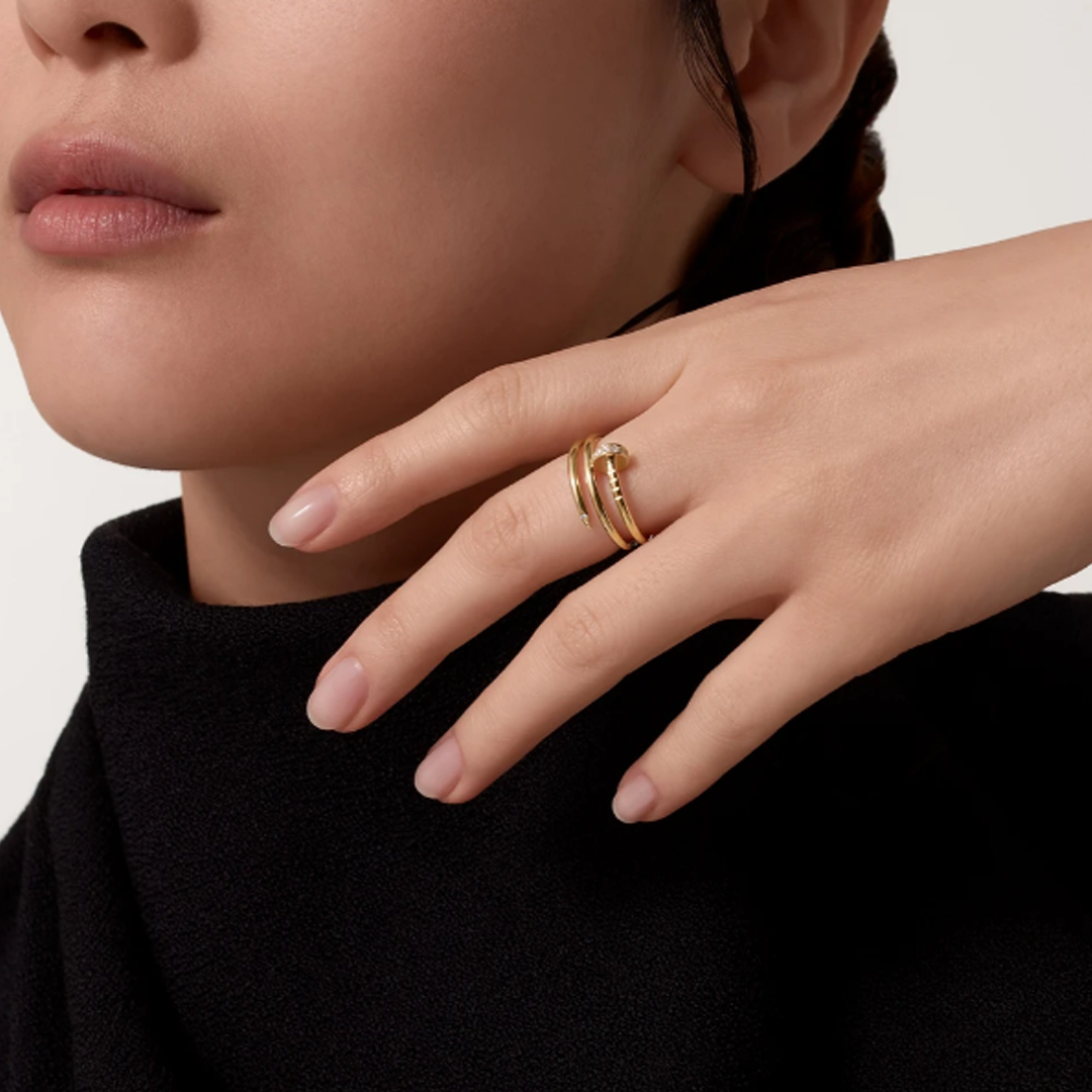 Bague dorée effet clou superposé