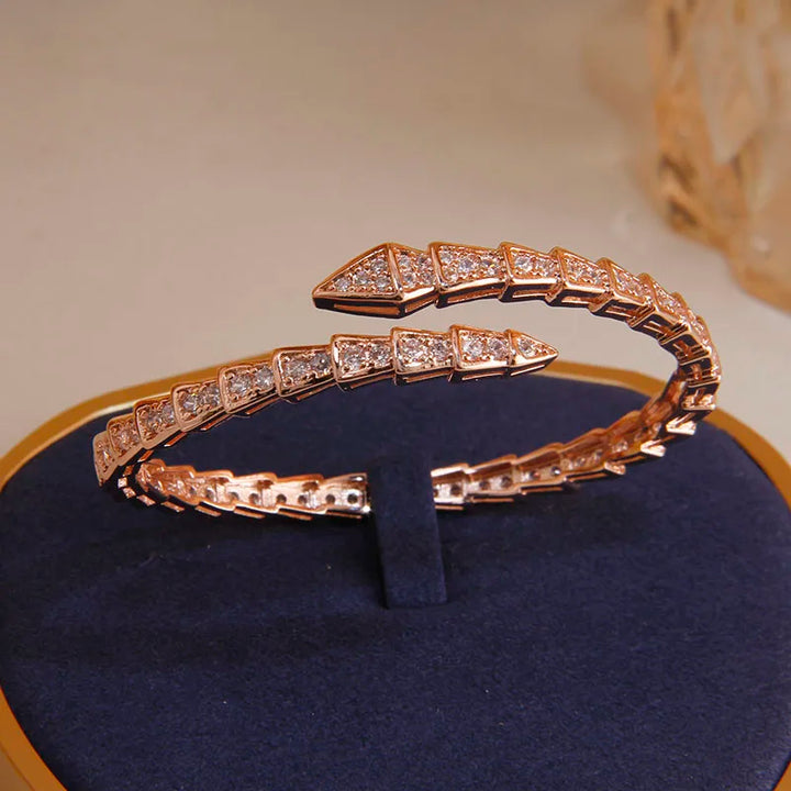 Bracelet serpent doré et cristaux