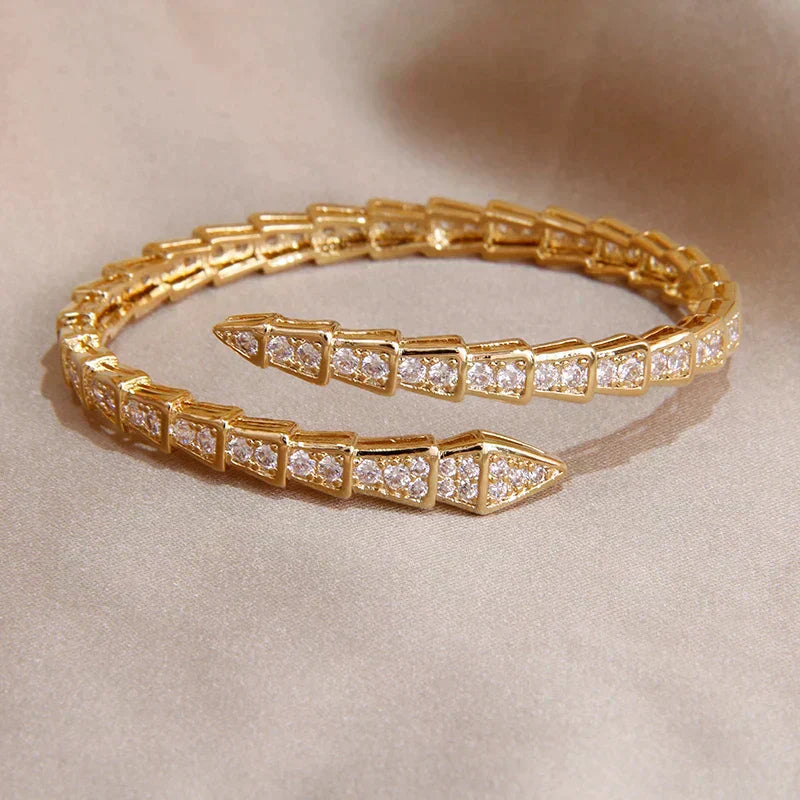 Bracelet serpent doré et cristaux
