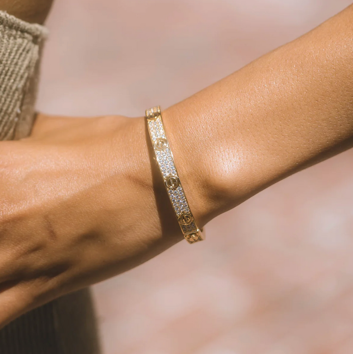 Bracelet doré et blanc Eternita